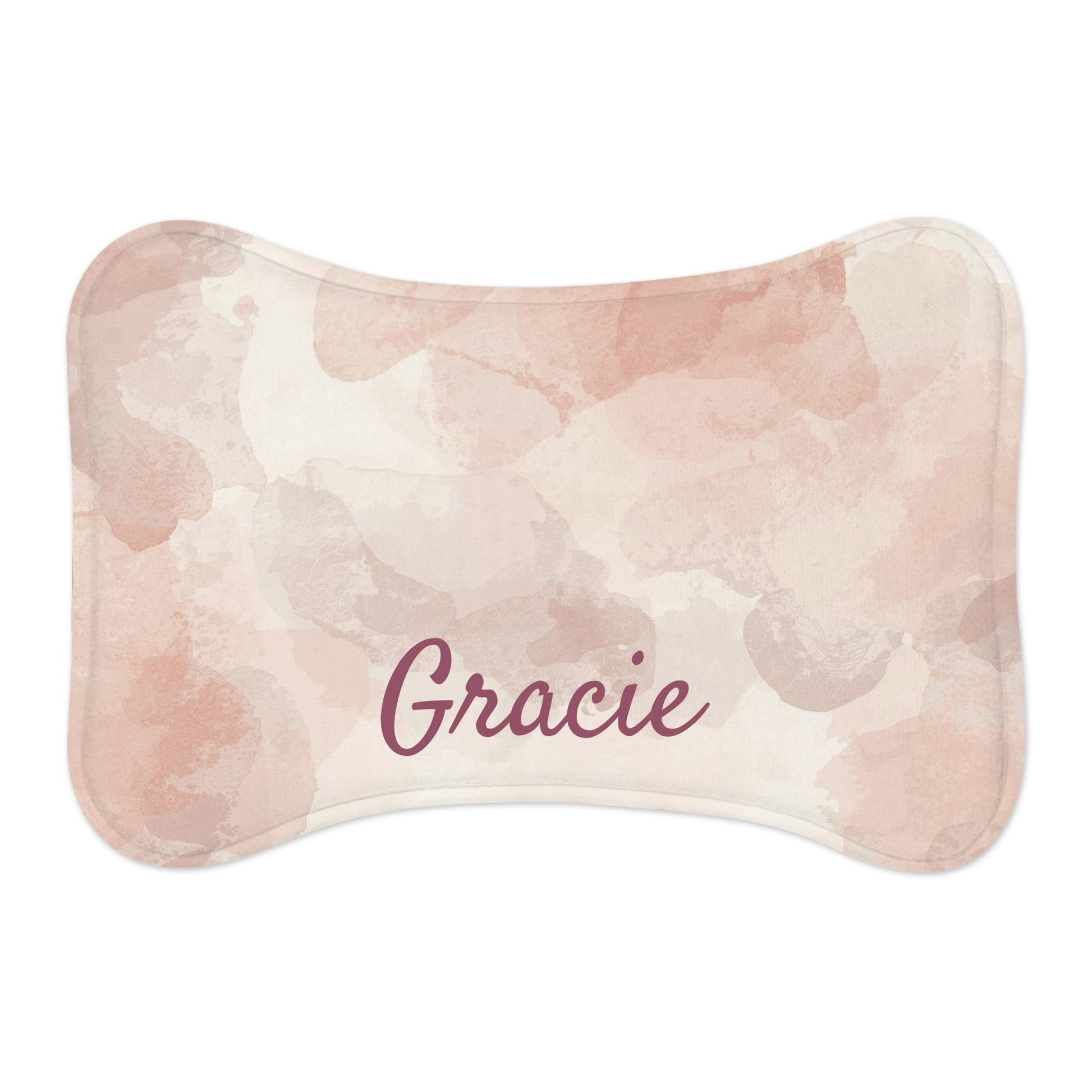 Pink watercolor personalized pet feeding mat with printed pet name, made for pets to keep bowls stable and protect flooring.