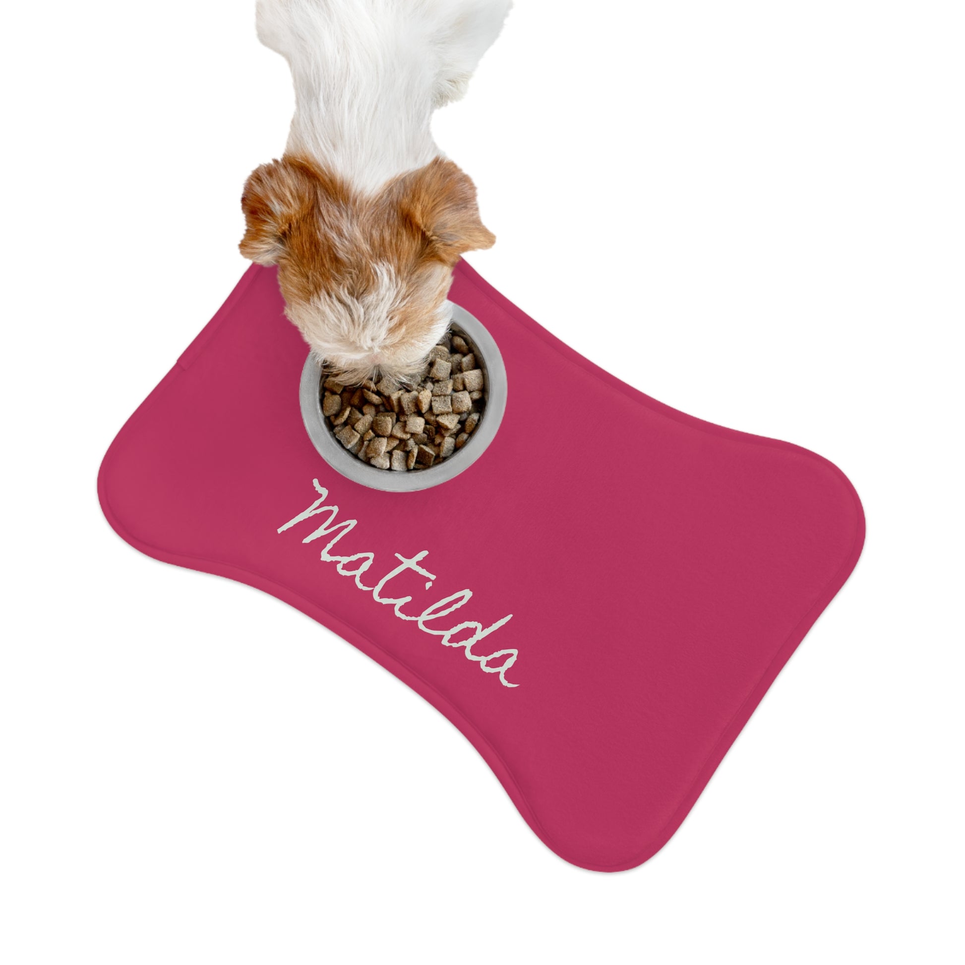 Hot pink personalized pet feeding mat by Printify, featuring a soft, durable surface with custom pet name engraving.