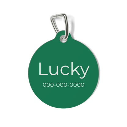 Green personalized pet ID tag with engraved details, designed for cats and dogs, featuring the Printify brand on a metal keyring.