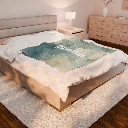 Personalized velveteen plush blanket with watercolor all-over print, soft and cozy fabric by Printify.