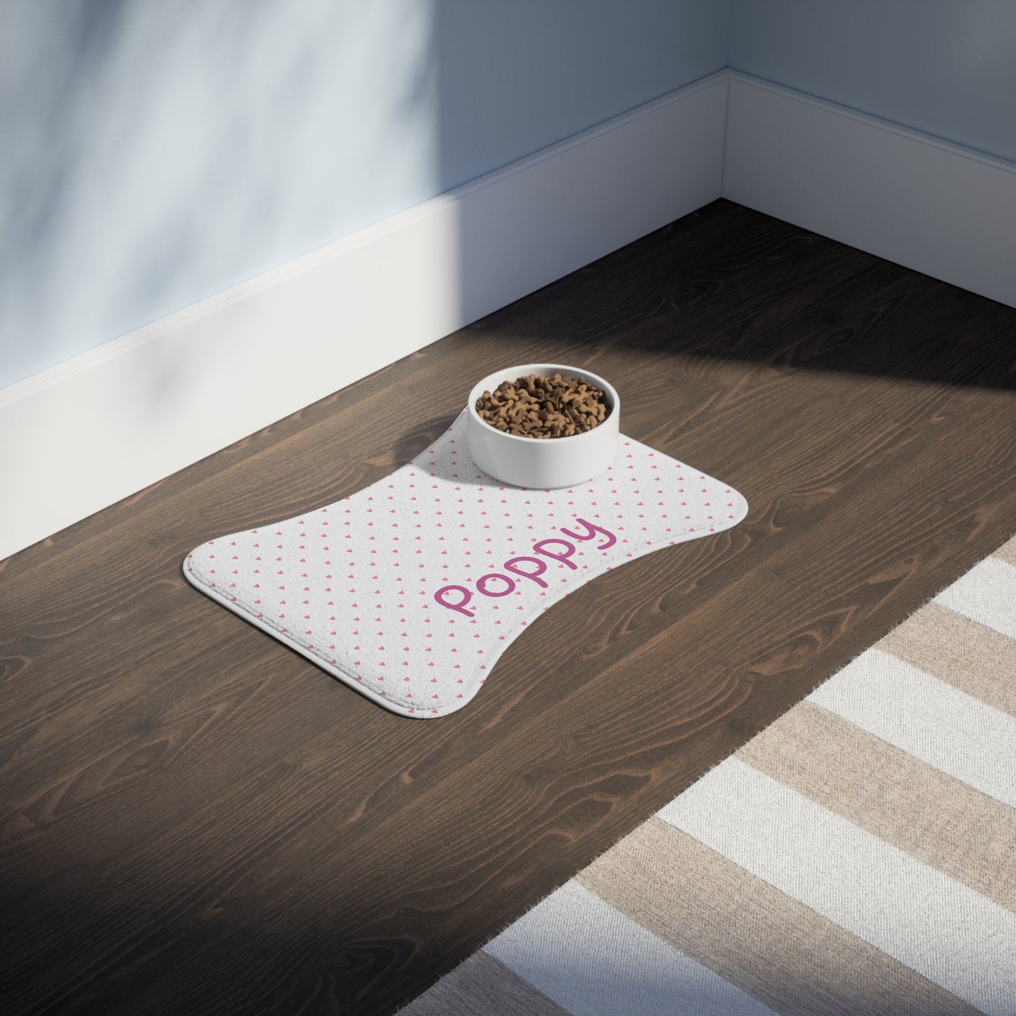 Personalized pet feeding mat with mini heart pattern, designed for pets, featuring custom text on a Printify pet accessory.