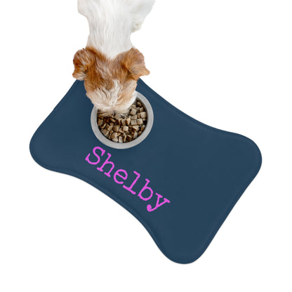 Personalized pet feeding mat in cadet blue with pet name, made by Printify, featuring a soft fabric surface and non-slip backing.