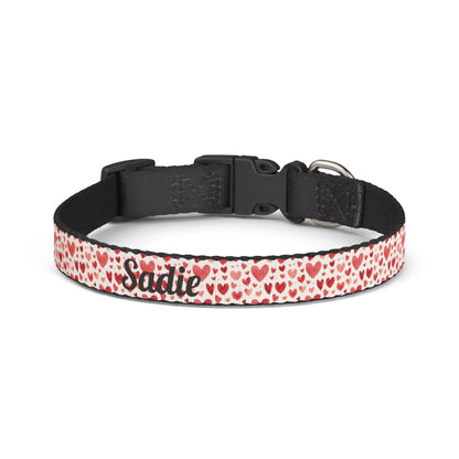 Personalized clip-on pet collar with a heart pattern, featuring adjustable straps and a cute, colorful design for small pets.