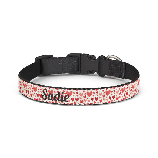 Personalized clip-on pet collar with a heart pattern, featuring adjustable straps and a cute, colorful design for small pets.