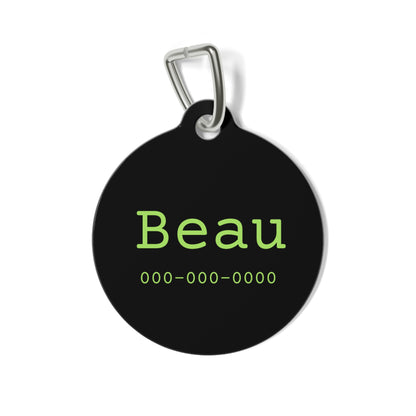 Personalized black and green pet ID tag with engraved details, suitable for dogs or cats, by Printify.