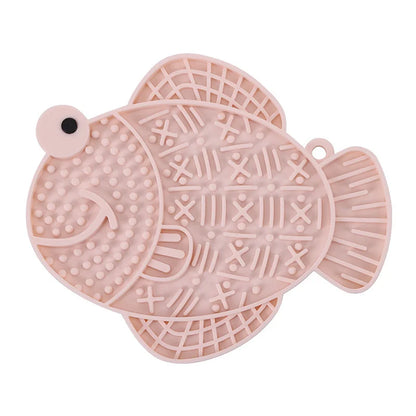 Fetch & Feature silicone pet slow feeder mat for cats and dogs, with suction cups and puzzle design for wet food and snacks.