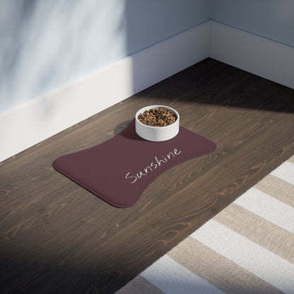 Personalized pet feeding mat with plum background featuring a customizable design, ideal for pet bowls and feeding area.