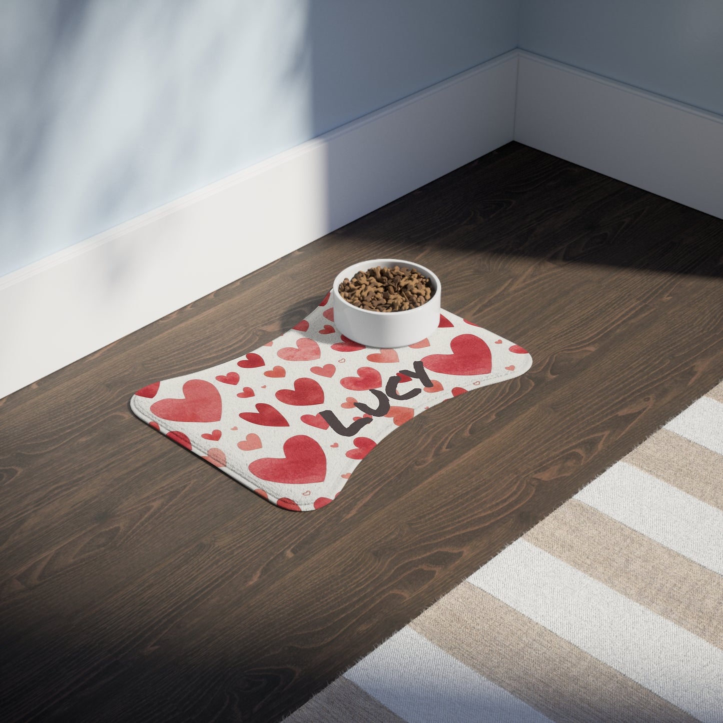 Personalized pet feeding mat with hearts pattern, waterproof surface, and non-slip backing for dogs and cats.