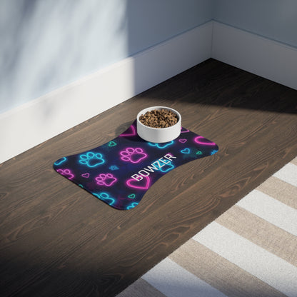 Personalized neon paws pet feeding mat with colorful paw print design, made for pets to keep feeding areas tidy.