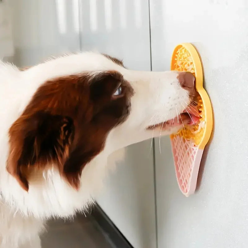 Fetch & Feature pet silicone slow feeder mat with suction cups, designed for cats and dogs to lick and enjoy wet food and snacks.