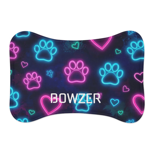 Personalized Neon Paws pet feeding mat with colorful paw print design for pets, made by Printify for comfortable feeding.