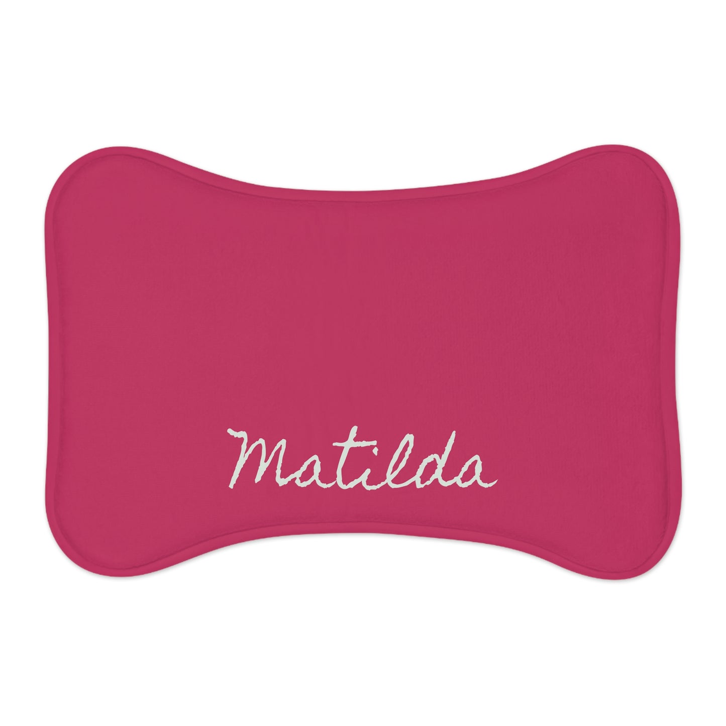 Hot pink personalized pet feeding mat with printed design, made for pets, by Printify, suitable for feeding bowls and preventing spills.