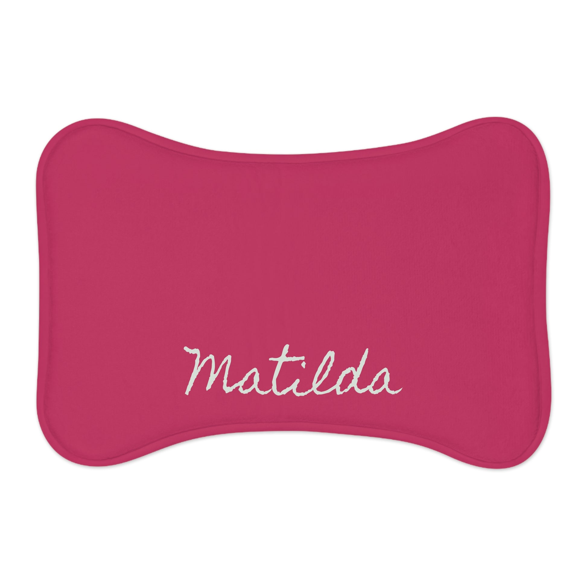 Hot pink personalized pet feeding mat with printed design, made for pets, by Printify, suitable for feeding bowls and preventing spills.