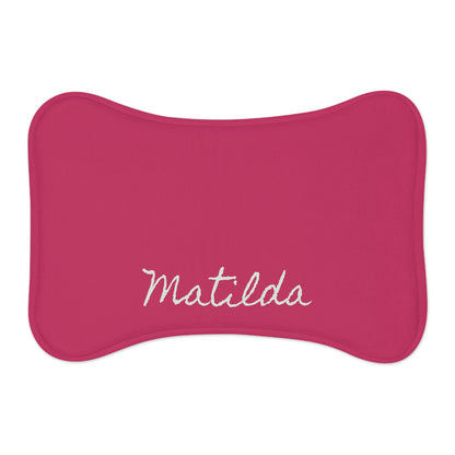 Hot pink personalized pet feeding mat with printed design, made for pets, by Printify, suitable for feeding bowls and preventing spills.