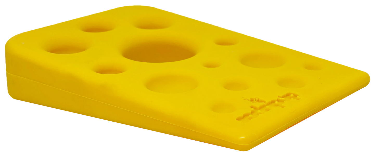SodaPup Swiss Cheese Wedge nylon dog chew toy for aggressive chewers, durable and shaped like a cheese wedge for dogs' play and chewing.