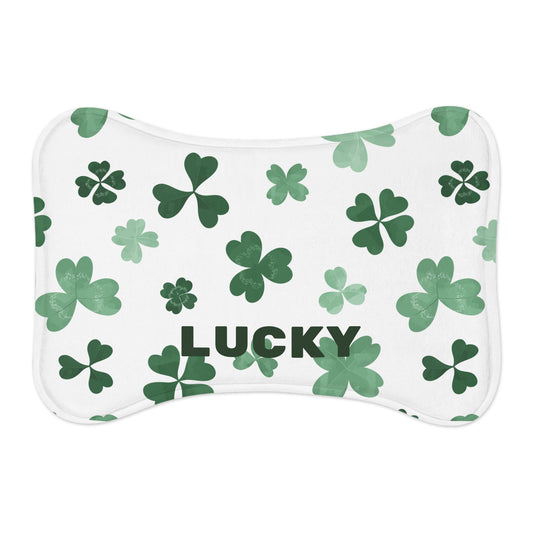 Personalized pet feeding mat in Lucky Green with custom pet name, made by Printify, featuring a soft, non-slip surface for pets.