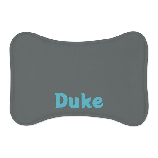Personalized pet feeding mat in charcoal color, with custom design, suitable for pets and made by Printify.