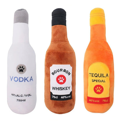 Soft plush dog chew toy shaped like an alcohol bottle with sound, designed for pet entertainment by Fetch & Feature.