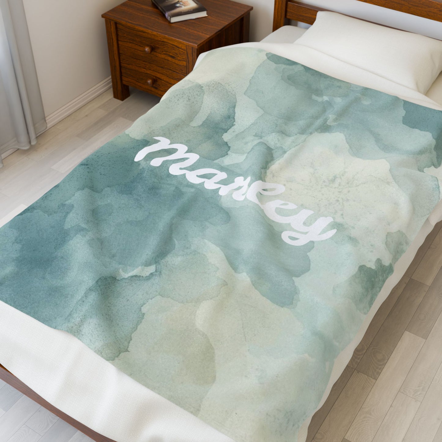 Personalized velveteen plush blanket with watercolor all-over print, featuring soft fabric and vibrant, artistic design.