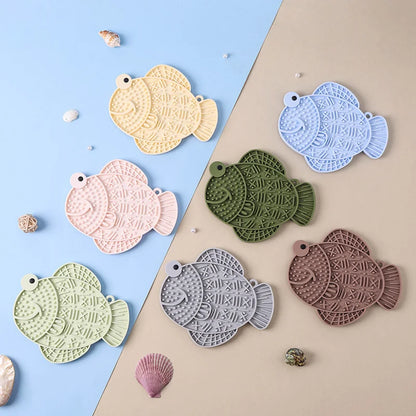 Fetch & Feature pet silicone slow feeder mat with anti-slip suction cups, designed for cats and dogs to enjoy wet food and snacks.