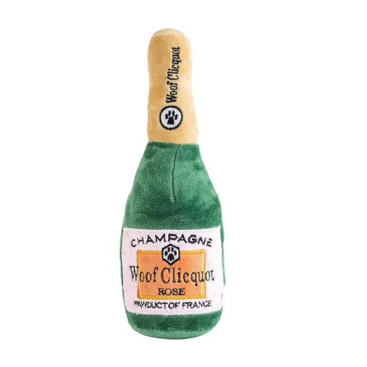 Yellow wine bottle-shaped dog toy from Fetch & Feature, interactive, sound, bite-resistant, machine washable, suitable for all dog breeds.